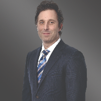 Michael J Baum